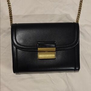 Madison West Black and Gold Clutch Crossbody Bag